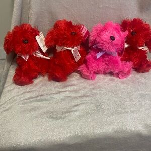 Red and Pink Plush Dogs